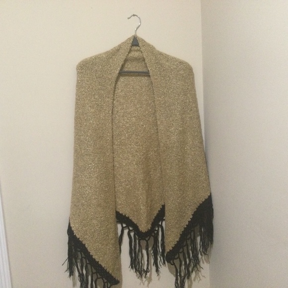 Beautiful wrap by Wind River. Measures 70” across by 30”. Gold with black fringe - Picture 1 of 2